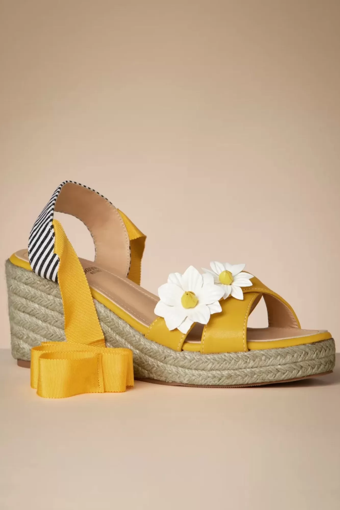 Shop Banned Retro Lady Daisy Wedges In Gelb